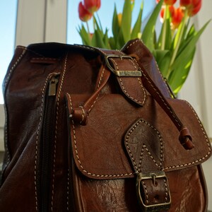 goatskin backpack mini purse Pebble Crossbody | Glam-Aholic Lifestyle | Brown | Vegan Leather | Small The gold buckles accent its drawstring closure REN / Tokyo Soft Goat