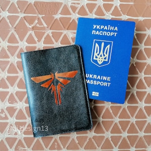 The Last of Us Souvenir, TLOU Firefly Logo Passhülle, Herren-Passhülle aus veganem Leder, weicher Passhalter, einzigartiges Gamergeschenk