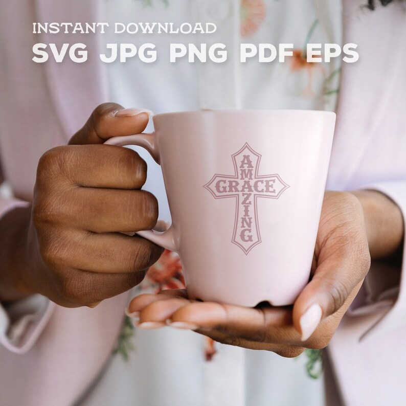May include: A pink ceramic mug with a cross design. The cross is made up of the words "Amazing Grace".