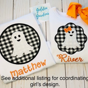 May include: Two white t-shirts with black and white checkered ghost designs. The shirt on the left says "matthew" and the shirt on the right says "River".