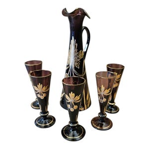 Burgundy hand painted glass liqueur set circa 1920