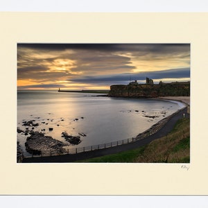 7x5″, A4 or A3 photograph in ivory or white mount with oak or black frame options featuring a photograph of Long Sands and Tynemouth Castle