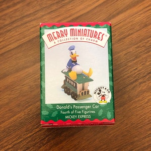 Coleção Hallmark Merry Miniatures Carro de passageiros de Donald