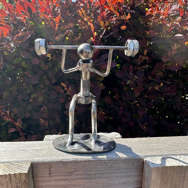 Nuts and Bolts Weight lifter made from recycled nuts, bolts and metal rods