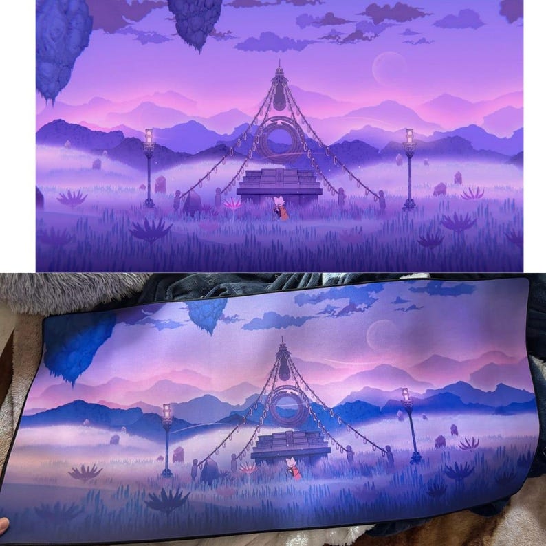 May include: A purple and pink landscape mousepad featuring a fantasy scene with a central structure, mountains, and floating islands. The design includes a fox-like character and a surreal, dreamlike atmosphere.