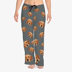 May include: Gray pajama pants with a repeating pattern of a golden retriever's face.