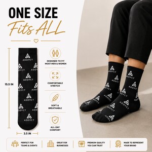 May include: Black socks with the text "ADDYCT" and a triangle logo. The socks are 15.5 inches long and 3.5 inches wide. The text "ONE SIZE FITS ALL" is at the top. The socks are designed to fit most people and are soft and breathable.