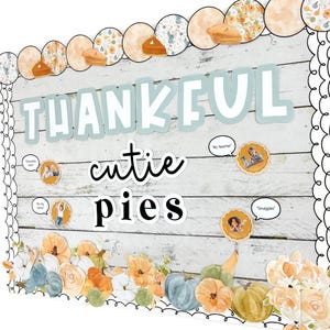 May include: A Thanksgiving-themed noticeboard with the words "Thankful cutie pies" in white and black lettering. The board is decorated with a border of autumn-coloured leaves and pumpkins. There are also several small pictures of children with speech bubbles.