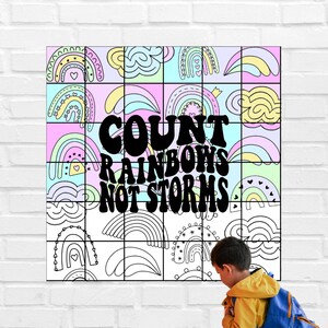 May include: A colourful poster with a grid of rainbow illustrations and the text "COUNT RAINBOWS NOT STORMS".