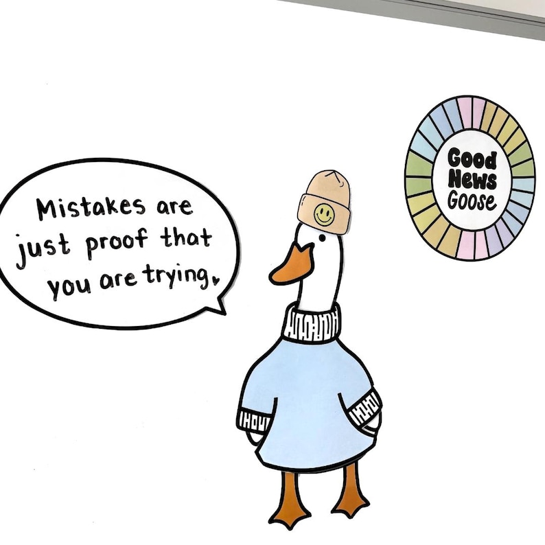 May include: A cartoon goose wearing a blue sweater and a brown beanie with a smiley face on it. The goose is saying "Mistakes are just proof that you are trying."