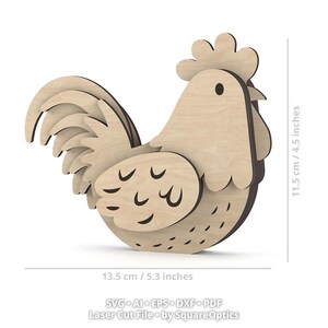 May include: A light-colored wooden rooster cutout with layered wing and tail feathers, measuring 5.3 inches wide by 4.5 inches high. The design features engraved details on the wing and body, with text below reading SVG AI EPS DXF PDF Laser Cut File by SquareOptics.