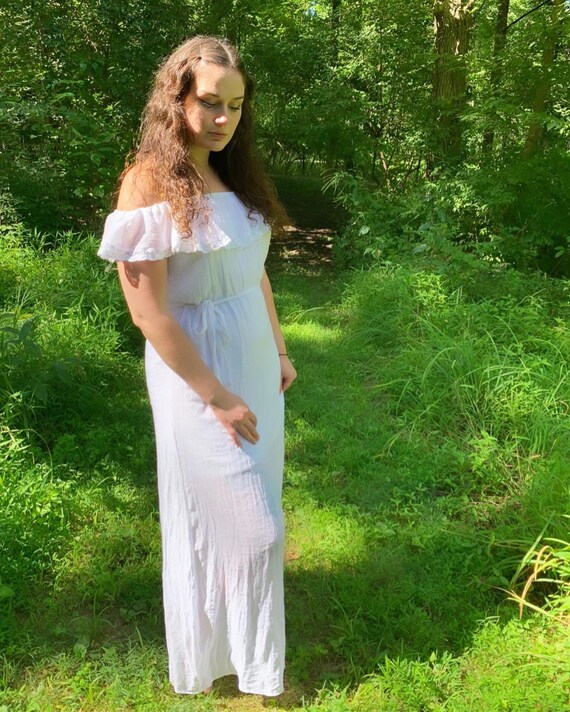 Off-shoulder white maxi dress