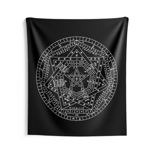 May include: Black wall tapestry featuring a white pentagram design within a complex circular pattern. The design includes geometric shapes, text, and symbols, creating a mystical aesthetic. The tapestry is made of a dark fabric.