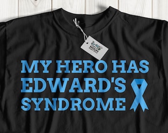 Könnte beinhalten: Schwarzes T-Shirt mit blauem Text, der "Mein Held hat das Edwards-Syndrom" lautet, und einem blauen Band.