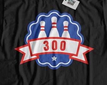 May include: Black t-shirt with a blue and red bowling pin graphic and the number 300.