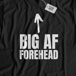 May include: Black t-shirt with a white arrow pointing upwards and the text "BIG AF FOREHEAD" printed on the front.