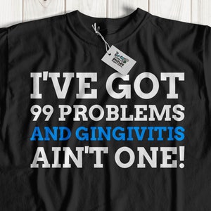 May include: Black t-shirt with white text that reads "I've got 99 problems and gingivitis ain't one!"