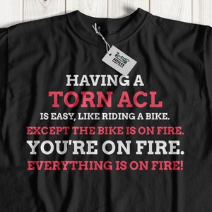 Unisex Funny Torn ACL T-Shirt | ACL Injury Gift Ideas | Knee Ligament Surgery Shirt | Anterior Cruciate Ligament Shirt