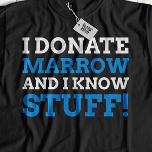 May include: Black t-shirt with white text that reads "I donate marrow and I know stuff!" in blue letters.