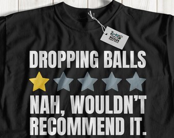 May include: Black t-shirt with white text that reads "Dropping Balls" with a one-star rating and the text "Nah, wouldn't recommend it."