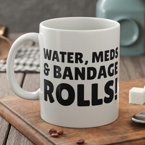 Water, Meds & Bandage Rolls! Funny Nurse Mug 11oz 330ml Gift For Matron