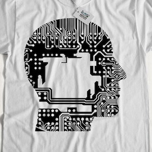 May include: White t-shirt featuring a black graphic of a human head made from circuit board patterns.