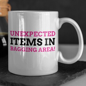 Unexpected Items In Bagging Area! Funny Boob Job Mug 11oz 330ml Plastic Surgery Gifts