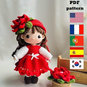 Pode incluir: Padrão de crochê PDF para uma boneca vermelha e branca com uma coroa de flores e um vaso de flores vermelho. O padrão está disponível em inglês, francês, português, espanhol e coreano.