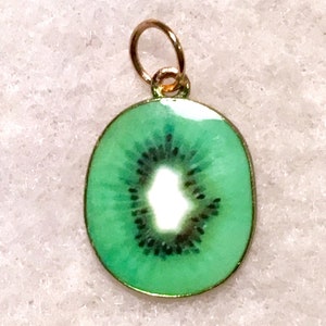 Miniature kiwi fruit- vintage enamel pendant/ charm