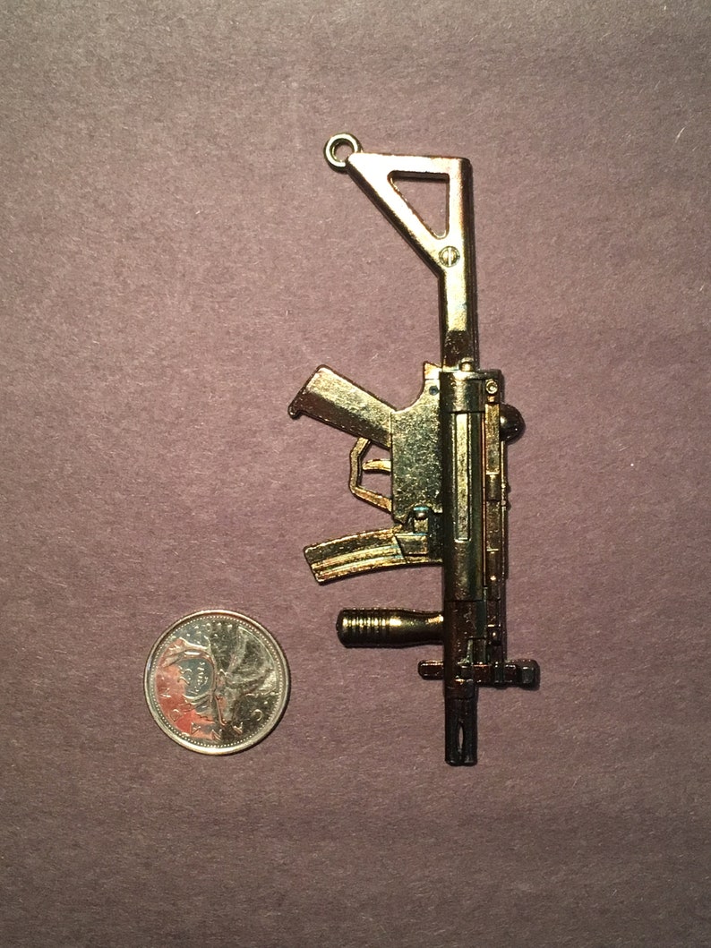Machine Gun vintage pendant