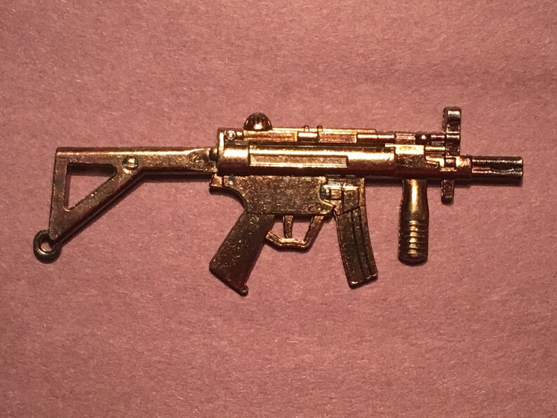 Machine Gun vintage pendant