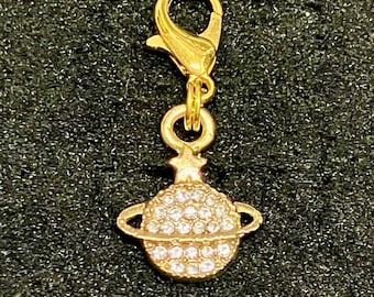 Vintage 18K gold plated charm with zirconia stones on spinner.