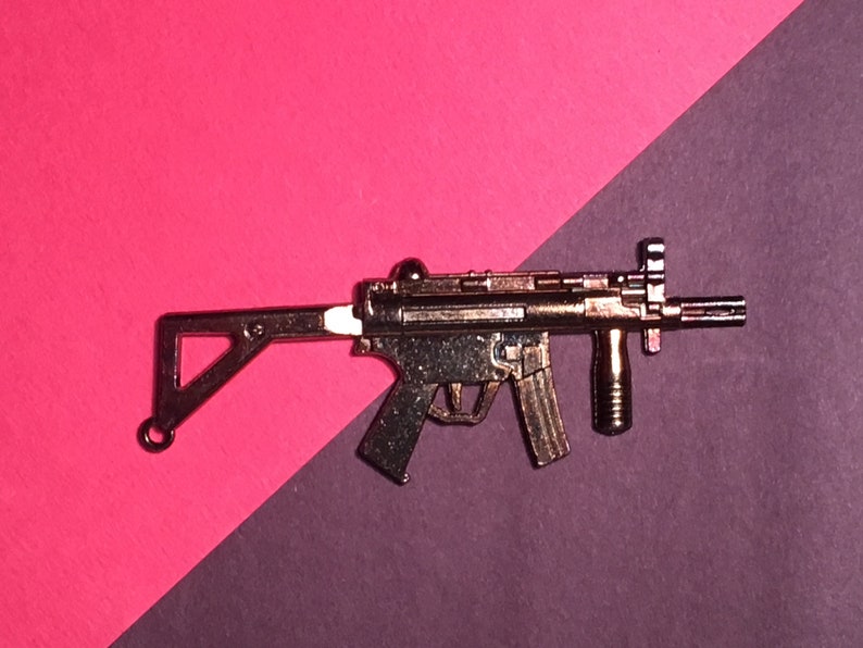 Machine Gun vintage pendant