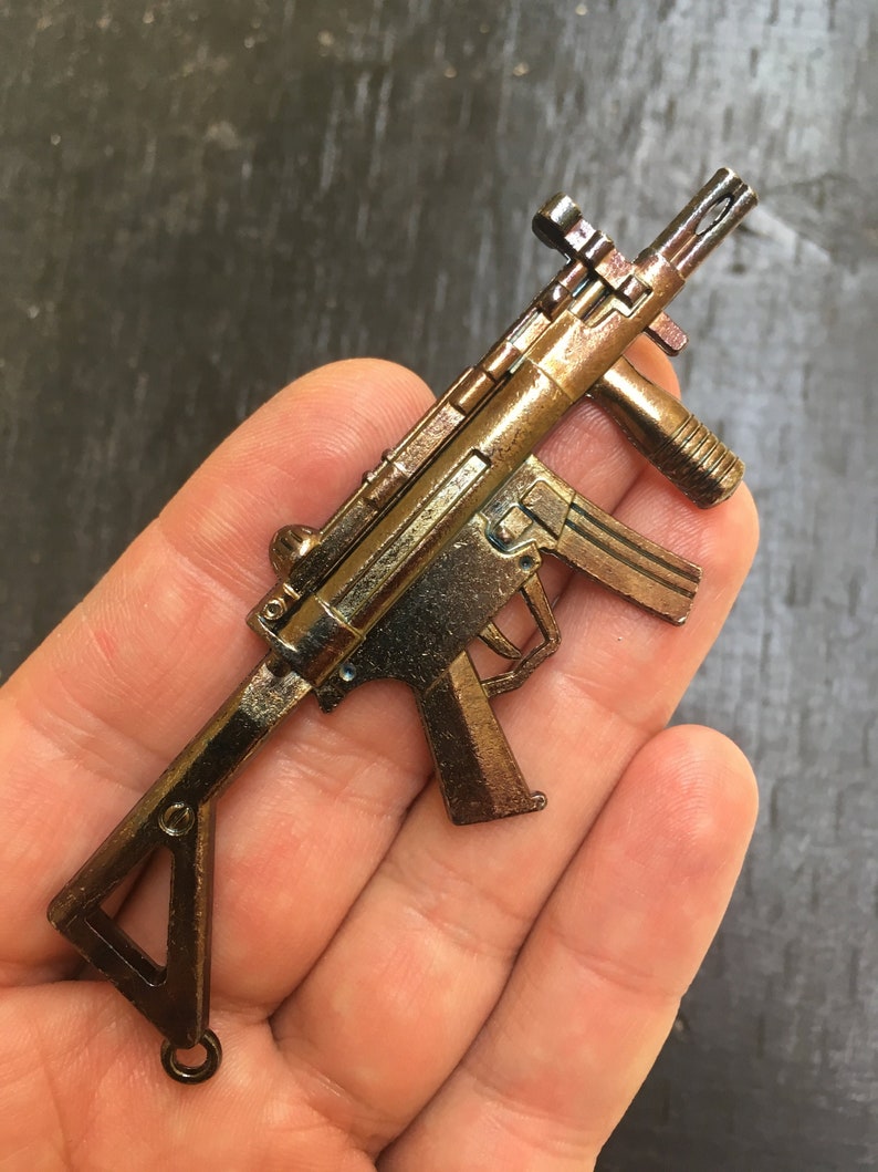 Machine Gun vintage pendant