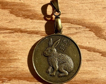 Year of Rabbit - vintage copper charm / pendant on spinner.