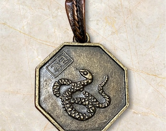 Year of snake - vintage copper charm / pendant on spinner.