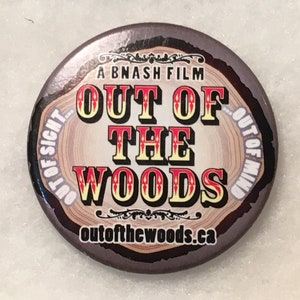 Out of the woods - vintage pin button.