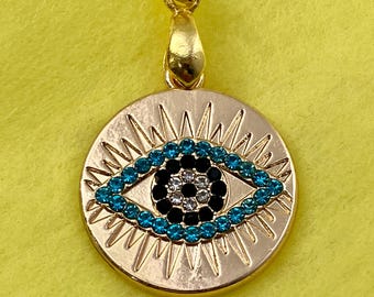 Spirit  eye - vintage enamel charm/ pendant on 18K gold plated spinner .