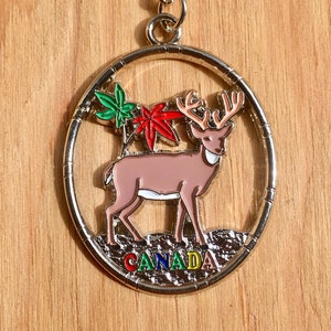 Canada  - vintage enamel charm on keychain.