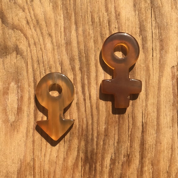 Set of two carved Agate stone gender symbols