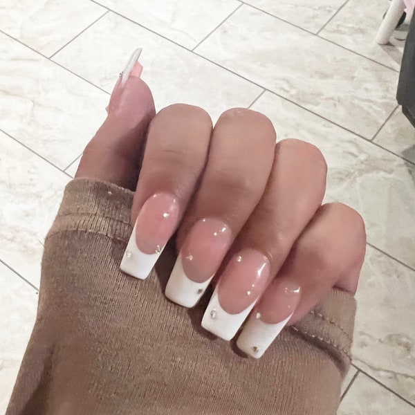 White French press on nails with rhinestones, French nails with diamonds, French nails with pearls, French tip nails with rhinestones, nails