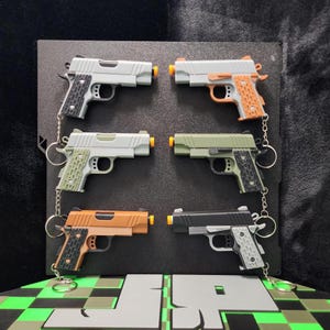 Colt 1911 Fidget Keychain Perforated Grip Mod – Slide-Action Toy. Multiple Color Options.
