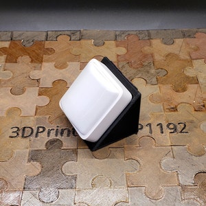 3D Printed WYZE Motion Sensor V2 Angled Mount.  Wyze Motion Sensor not included.