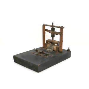 Telegraph Sounder between 1875-1900s early railroad device for amplifying sounds.