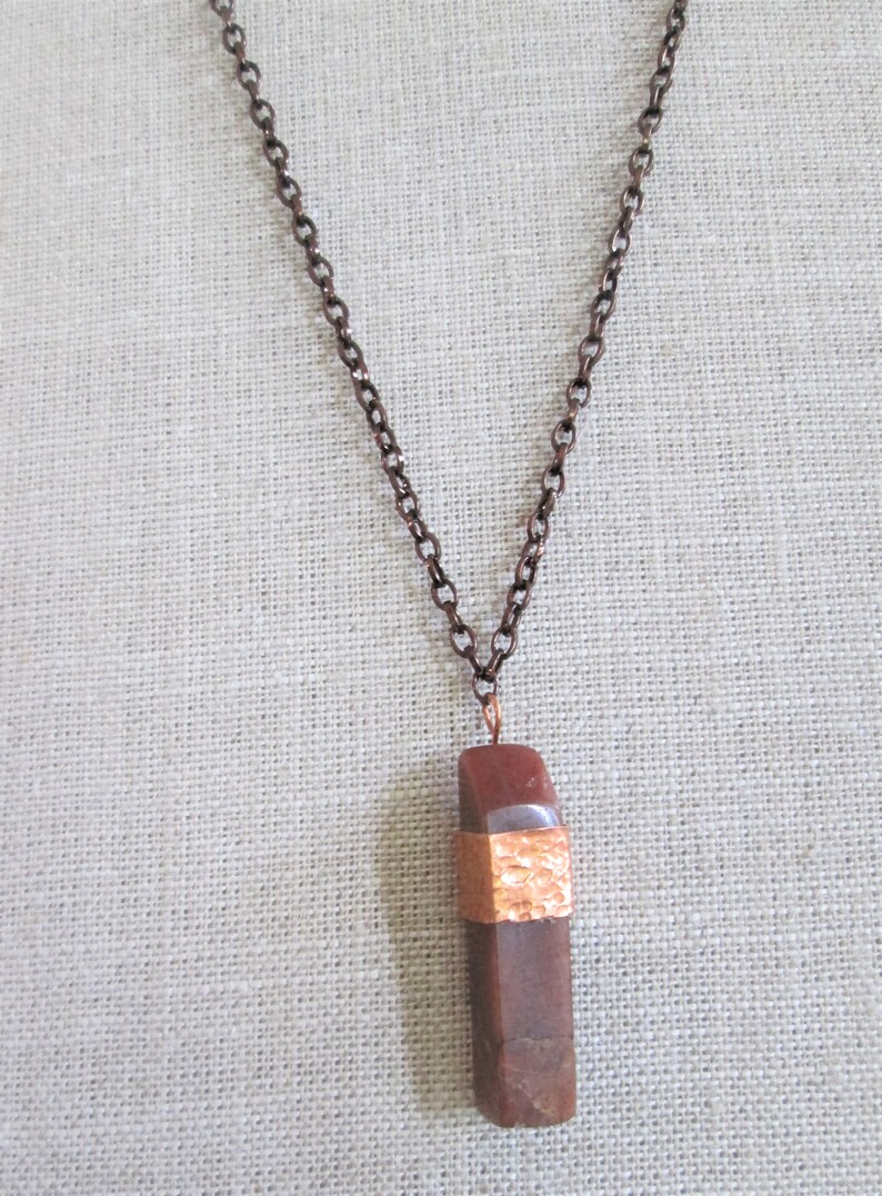 red onyx stone pendent with copper