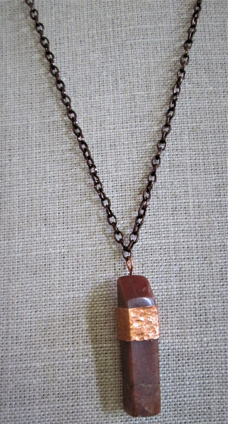 red onyx stone pendent with copper