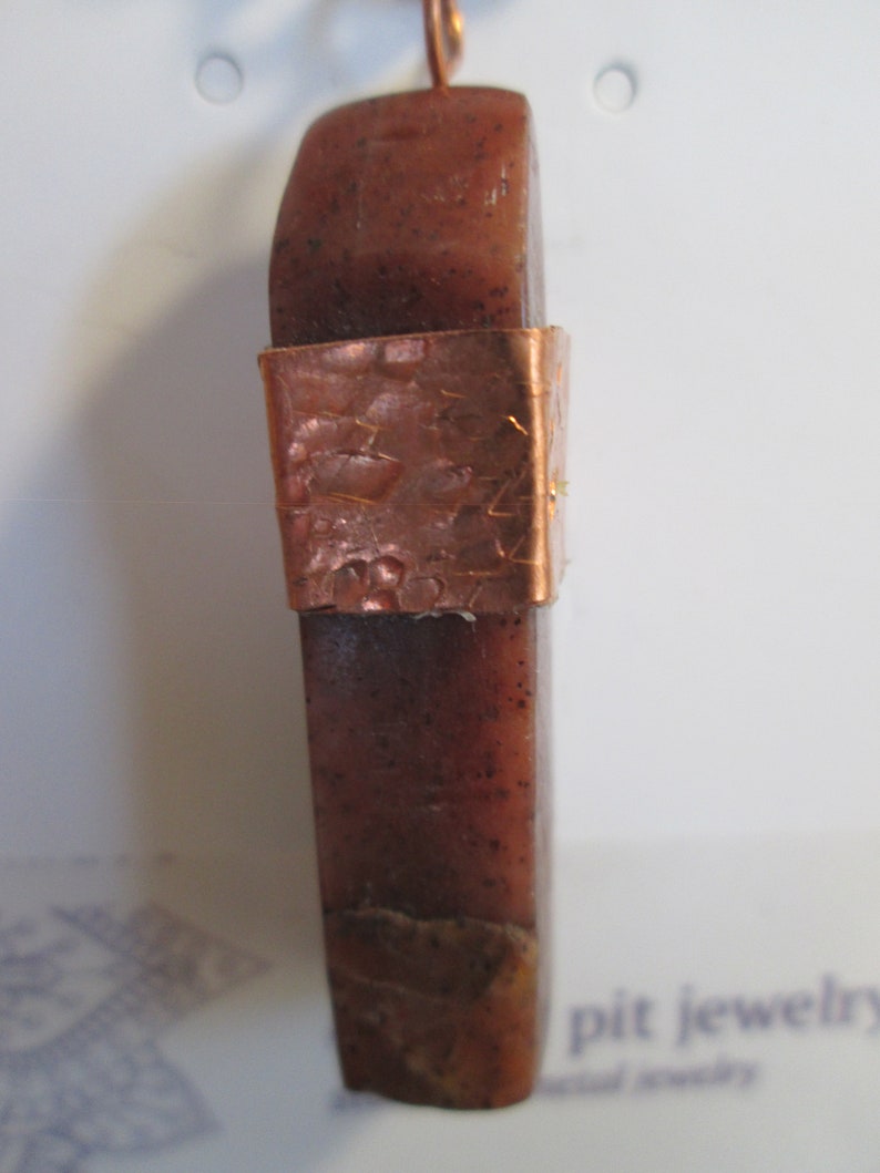red onyx stone pendent with copper