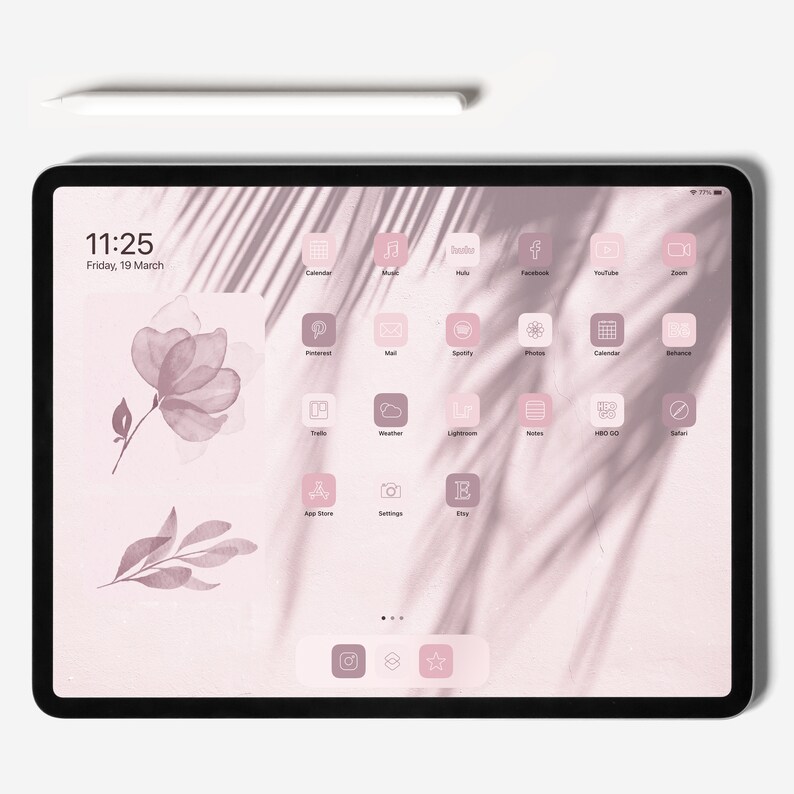 May include: A pink iPad with a white stylus on a white surface. The iPad screen displays a pink and white home screen with a variety of app icons, including Calendar, Music, Hulu, Facebook, YouTube, Zoom, Pinterest, Mail, Spotify, Photos, Calendar, Behance, Trello, Weather, Lightroom, Notes, HBO GO, Safari, App Store, Settings, and Etsy. The time is 11:25 and the date is Friday, 19 March.