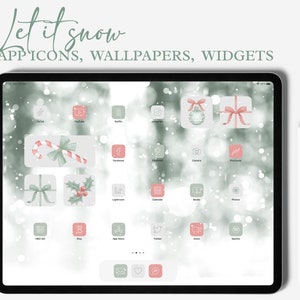 May include: A digital tablet screen displaying a green and white winter-themed wallpaper with a variety of app icons. The icons are decorated with a green and pink color scheme and feature holiday-themed designs such as candy canes, presents, and holly.