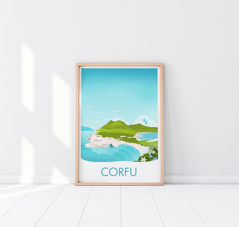 May include: A framed art print featuring a scenic view of Corfu, Greece. The artwork depicts green hills, blue water, and a bright sky. The word "CORFU" is printed in a teal font at the bottom of the print.
